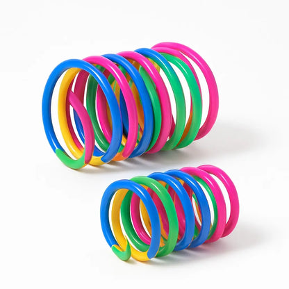 A vibrant set of colorful spring toys for cats, perfect for interactive play and exercise